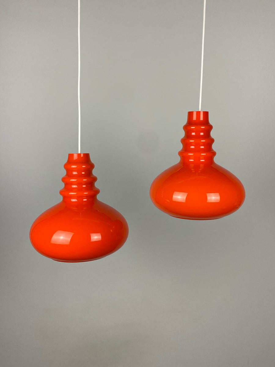 Pair of bright orange glass pendant lights by Peill and Putzler 1960 모이아띠